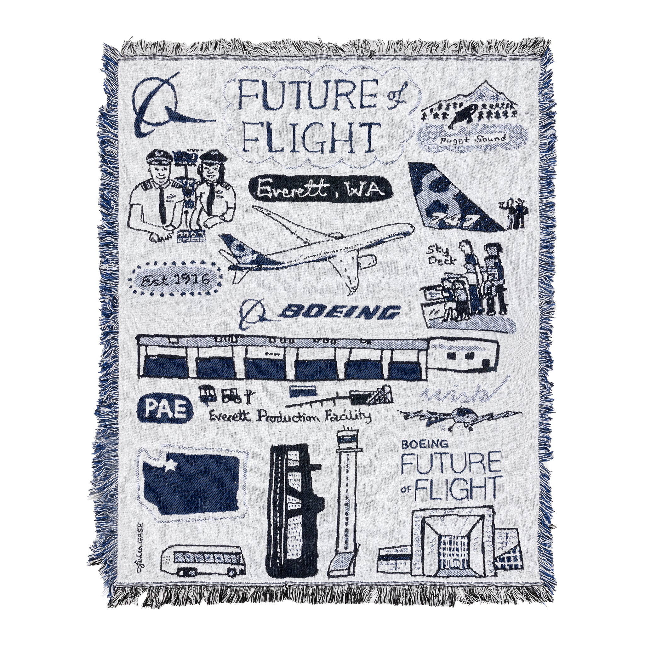 The Boeing Future Of Flight Destination Blanket by BOEING showcases aviation-themed woven quality with Julia Gash’s custom illustrations and text, featuring an airplane, control tower, tour bus, “Future of Flight,” “Everett, WA,” “Boeing,” and “PAE.”.