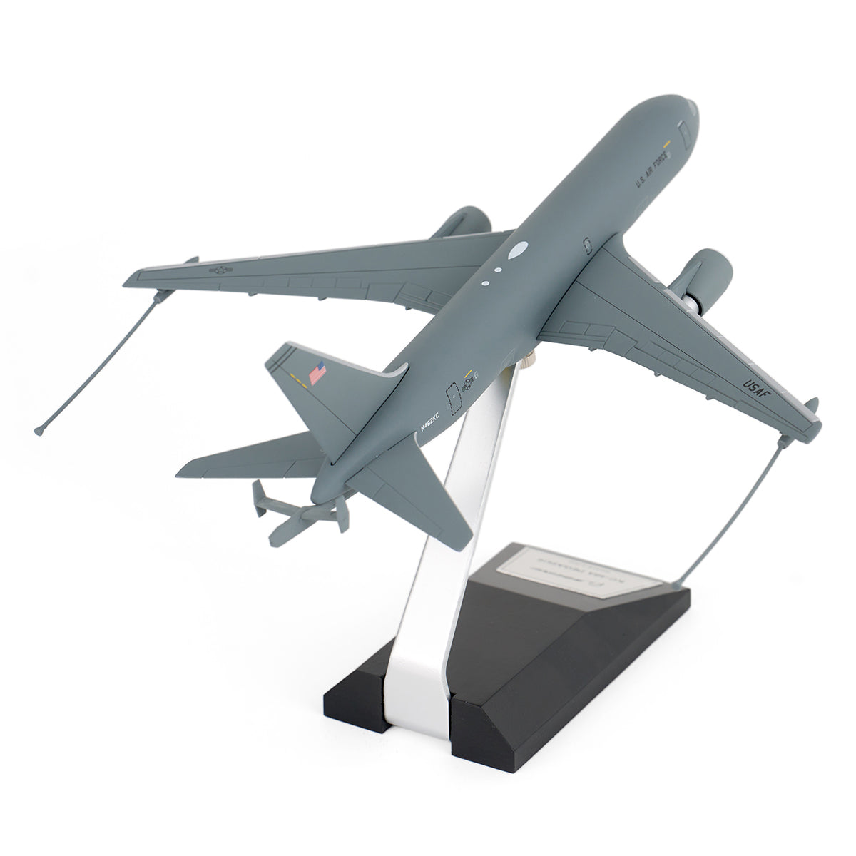 The DARON Boeing KC-46A Pegasus 1:200 Model is a gray U.S. Air Force collectors aircraft displayed on a stand, seen from the rear with refueling booms extended from its tail and wings.