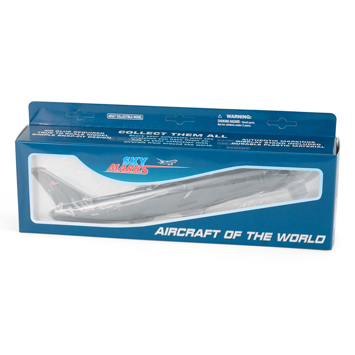 The DARON Boeing KC-46A Pegasus 1:200 Model comes in a blue Sky Marks Aircraft of the World box with a clear window, displaying the plane inside. The packaging features collectors’ info and safety warnings.