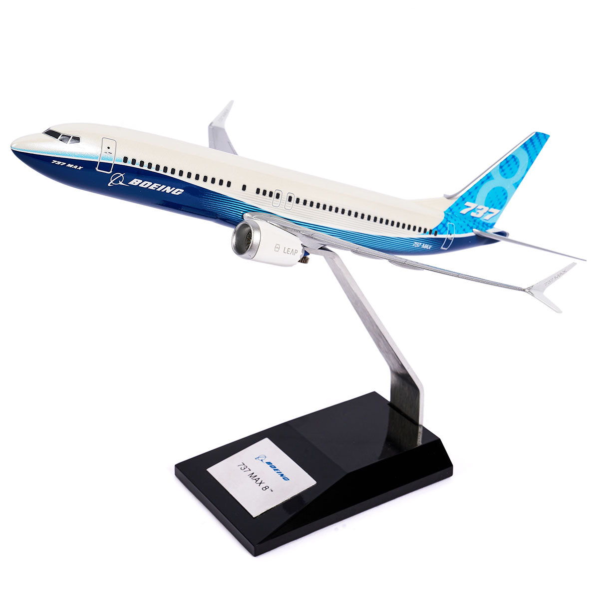 The Pacific Miniatures Boeing Unified 737 MAX 8 1:144 Model, crafted from precision injection-molded plastic in white and blue, features a detailed cockpit, wings, and engines. The included stand displays Boeing 737 MAX, highlighting its sleek design and renowned fuel efficiency.