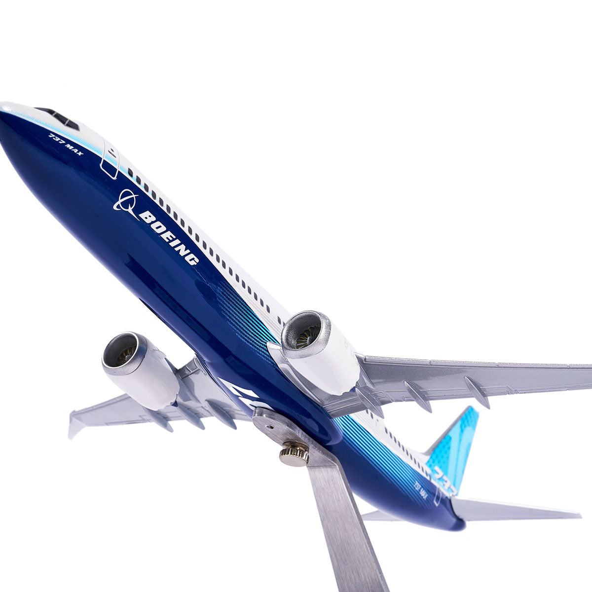 The Boeing Stores Boeing Unified 737 MAX 10 1:144 Model showcases a blue and white 737 MAX 10 in flight with Advanced Technology winglets, mounted on a stand to highlight its design features.