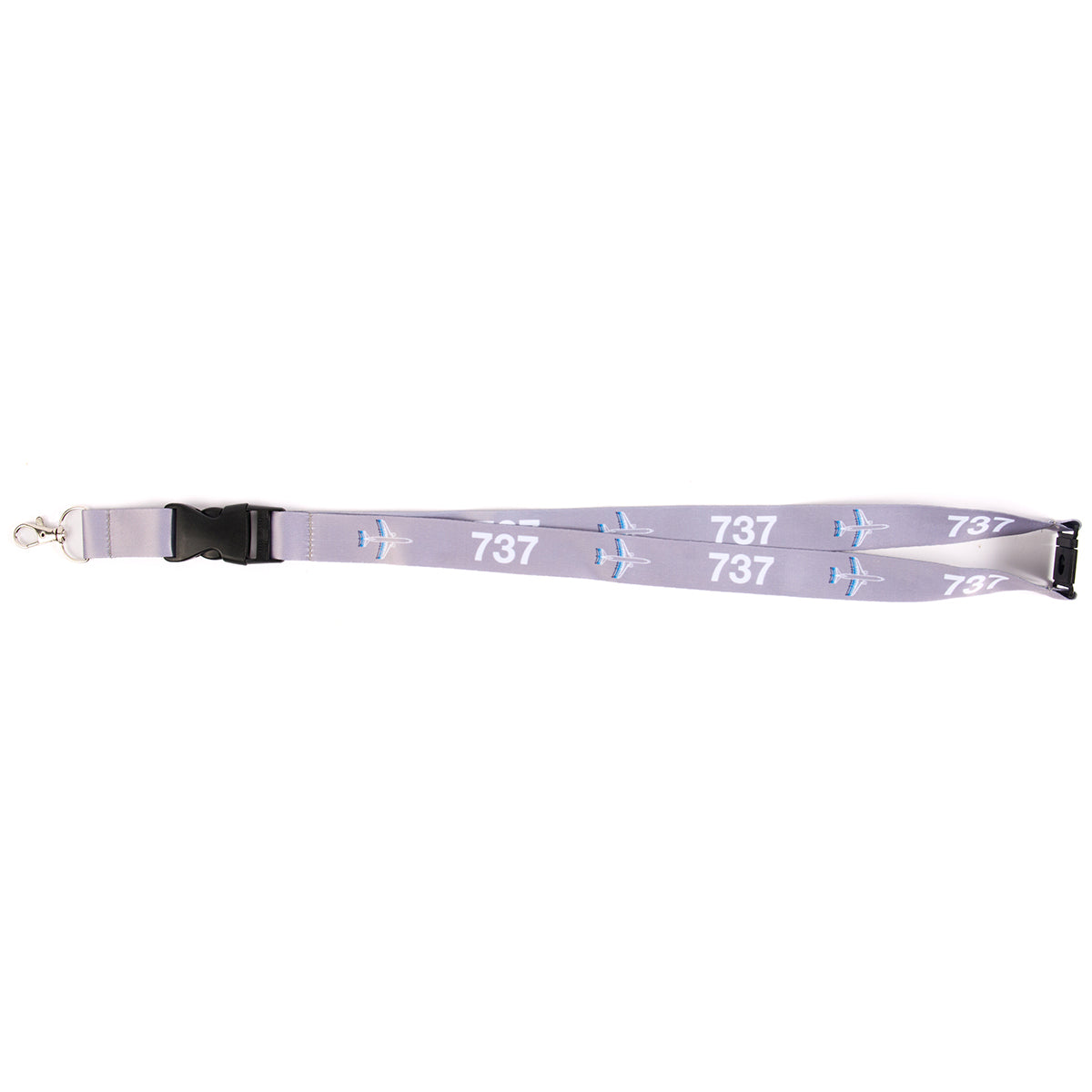 Introducing The Boeing Stores Boeing 737 Motion Lanyard: a gray strap featuring white and blue airplane illustrations and a 737 sublimation print, complete with a black plastic buckle and metal clip for easy use.