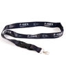 The Boeing Stores F-15EX Eagle Motion Lanyard, navy with white jet outlines, features plastic buckles and a metal clip, offering both function and style.