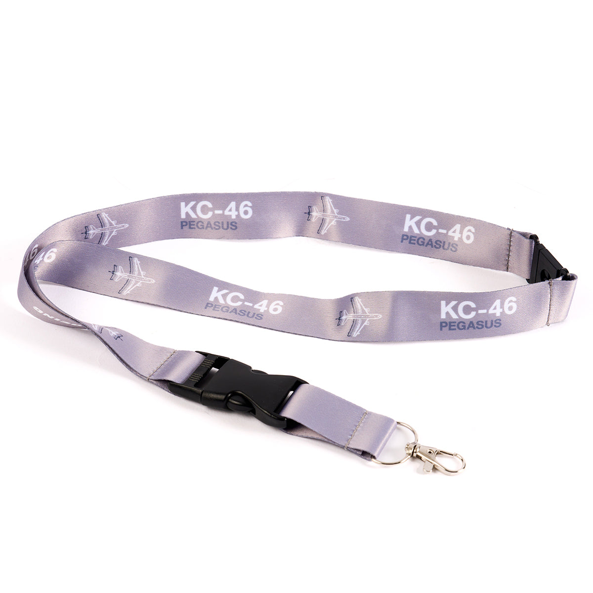 The Boeing Stores grey KC-46 Pegasus Motion Lanyard, featuring black plastic buckle and metal clip, showcases aviation-inspired text KC-46 PEGASUS with an aircraft silhouette repeated along its length.
