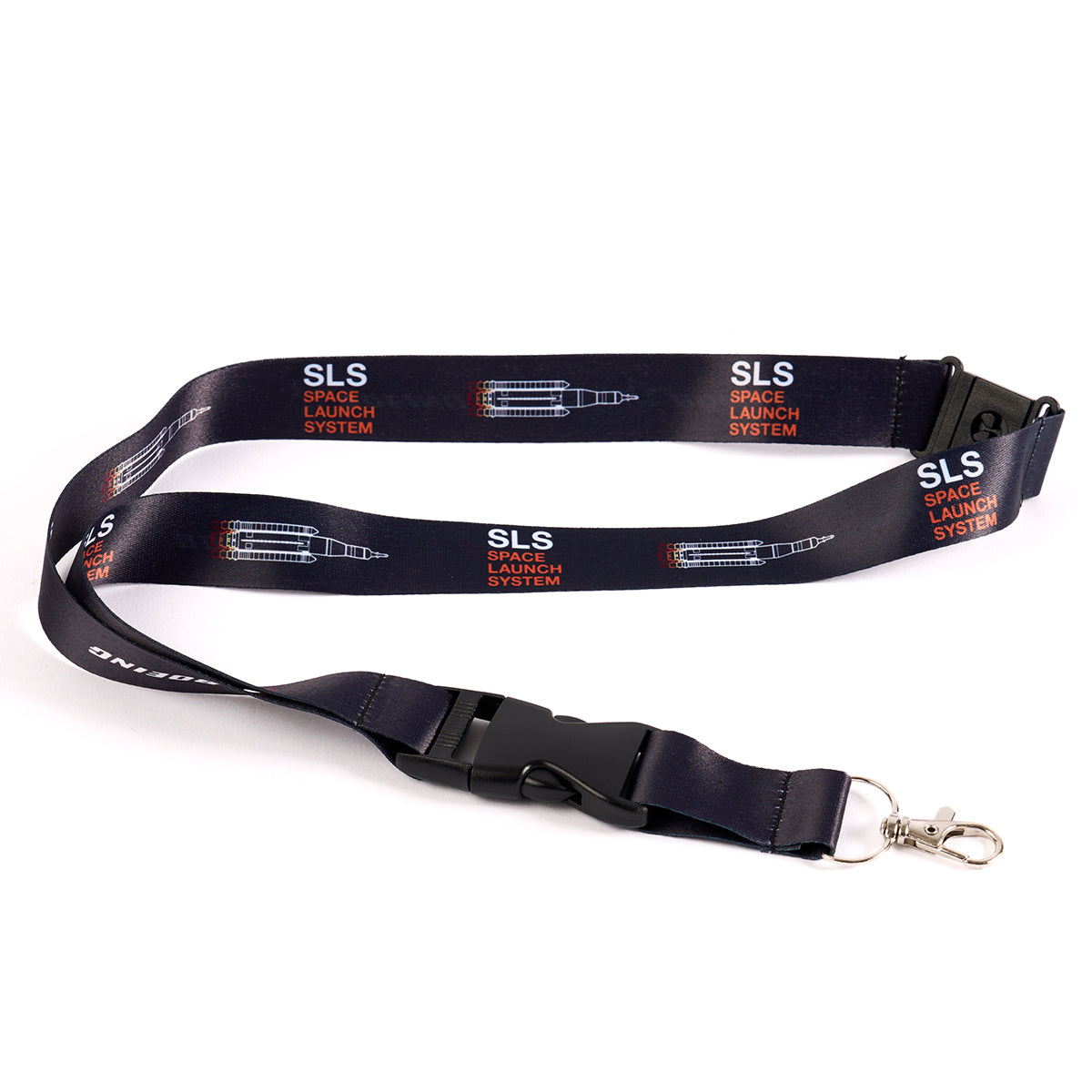 The Boeing Stores Boeing Space Launch System Motion Lanyard, with black lanyard and repeating rocket graphics, features SLS Space Launch System text inspired by aviation design. It comes with a black plastic buckle and a silver metal clasp for a sleek look.