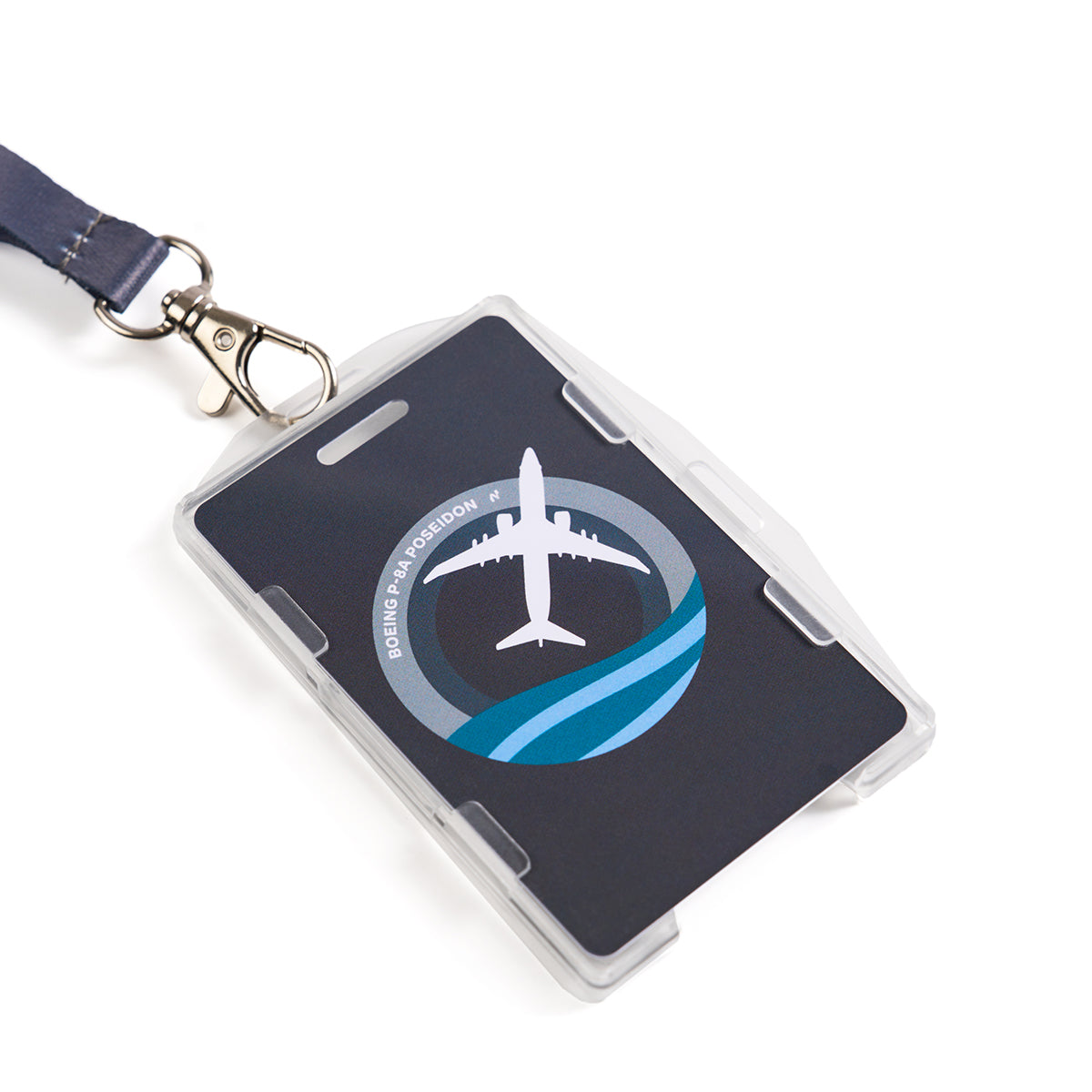 The Boeing P-8 Poseidon Skyward Lanyard features a circular badge with an airplane graphic in blue and gray sublimation print. Its encased in a clear holder and attached with a silver clip.