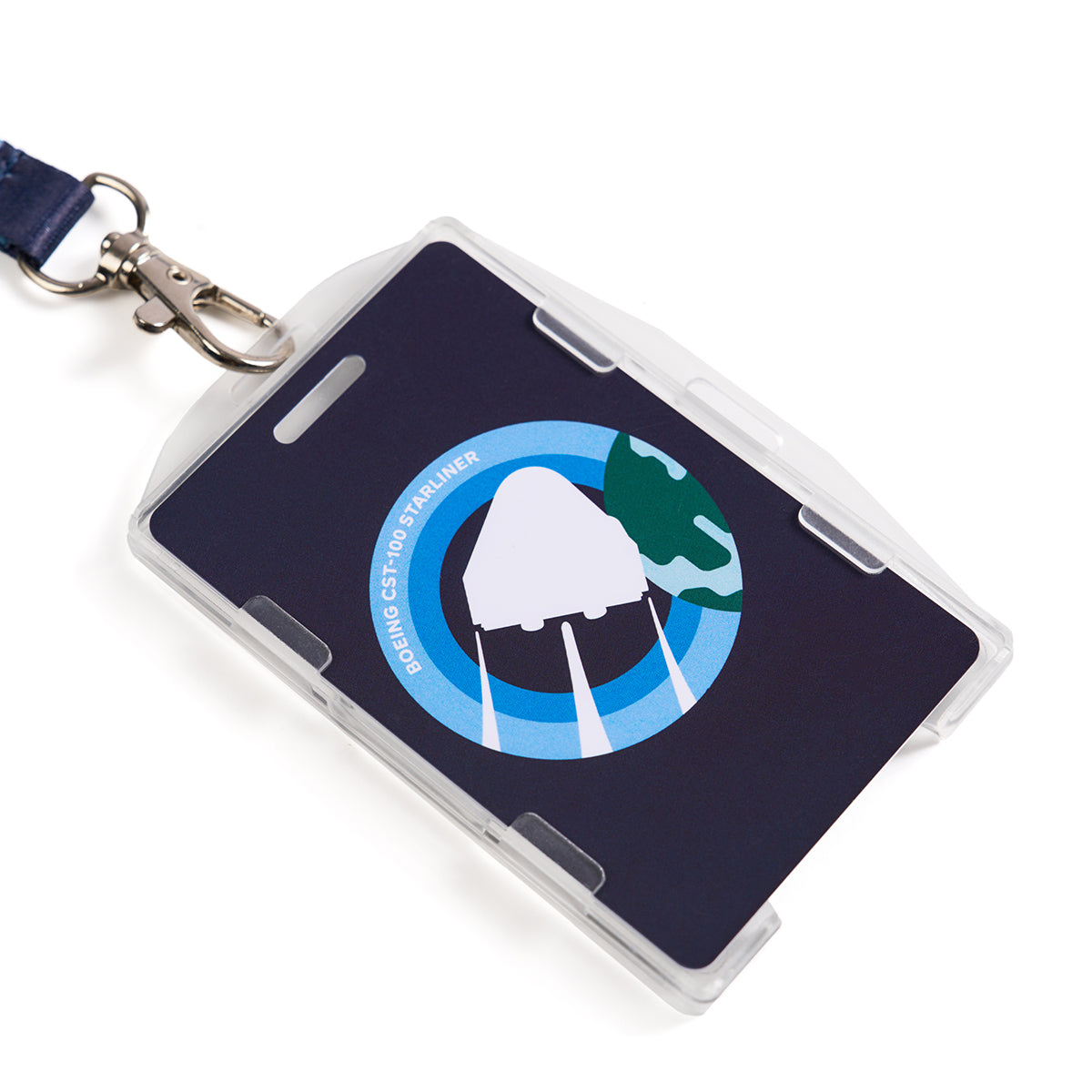 A close-up presents the Boeing CST-100 Starliner Skyward Lanyard, a badge holder with a spacecraft sublimation print against a blue background, embodying innovation and exploration.