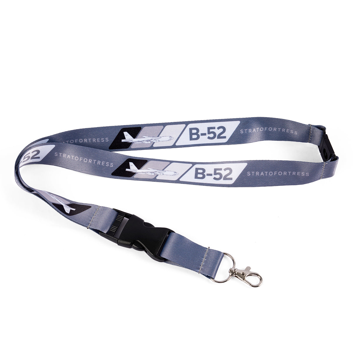 The Boeing B-52 Velocity Lanyard by Boeing, in a gray sublimation print, features airplane images, B-52, and STRATOFORTRESS text. It includes a black plastic clasp and metal clip—ideal for any B-52 fan.