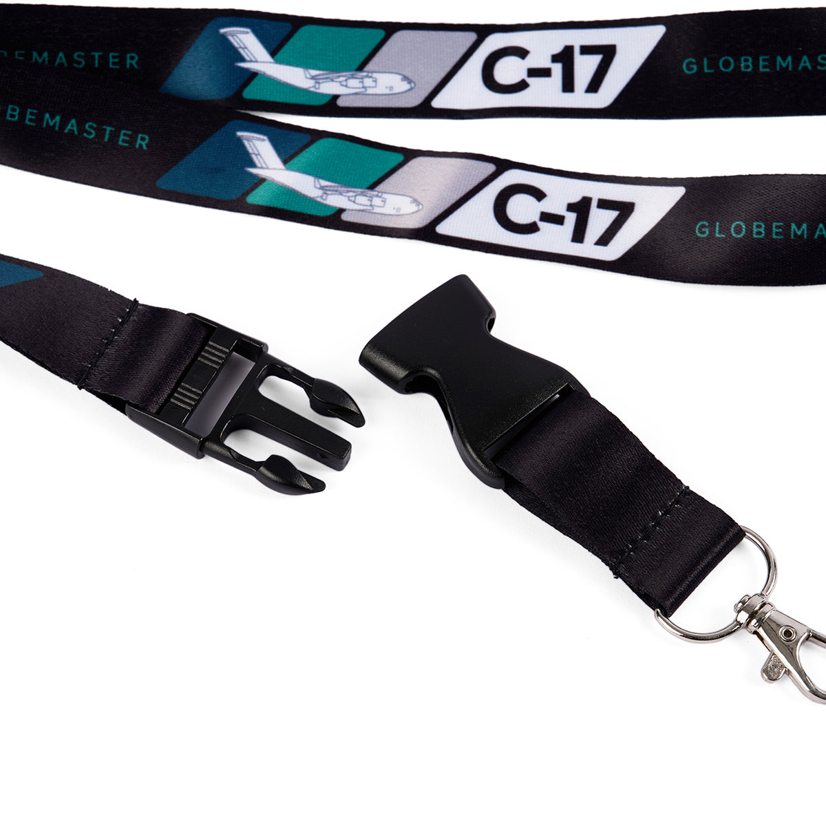 The Boeing C-17 Globemaster Velocity Lanyard by Boeing is a sleek black lanyard featuring vibrant sublimation printing with airplane graphics. It includes a sturdy plastic buckle and durable metal clip for secure attachment.