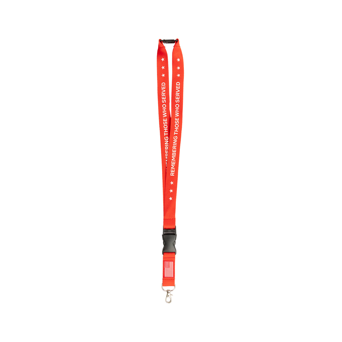 Boeing Remembering Those Who Served lanyard in red with white stars, the repeating text REMEMBERING THOSE WHO SERVED, an American flag graphic, and a metal clasp at the bottom.