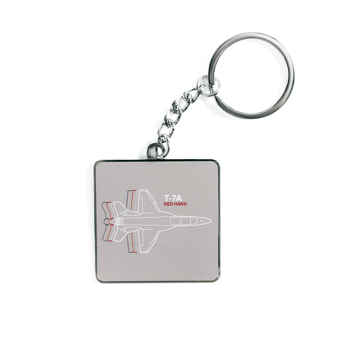 The Boeing Stores T-7A Red Hawk Motion Keychain features an aviation-themed square metallic design with a chain and ring. A line drawing of the T-7A Red Hawk aircraft in white and red is set against a gray backdrop—ideal for Boeing fans.