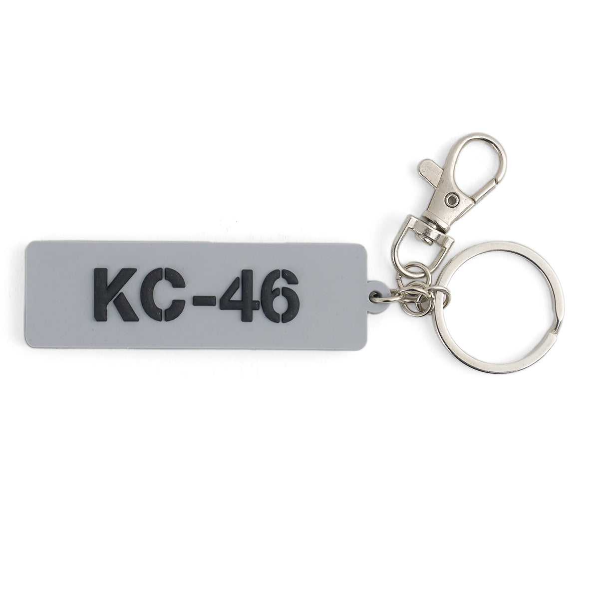 The BOEING KC-46A Pegasus Series Keychain features a gray rectangle with black KC-46 text, attached to a metal keyring and silver lobster clasp—ideal for aviation enthusiasts or Boeing fans.