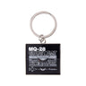 Square Boeing MQ-28 Ghost Bat Graphic Keychain featuring text above a wireframe illustration of the unmanned flight vehicle and line drawings of the plane from different angles.