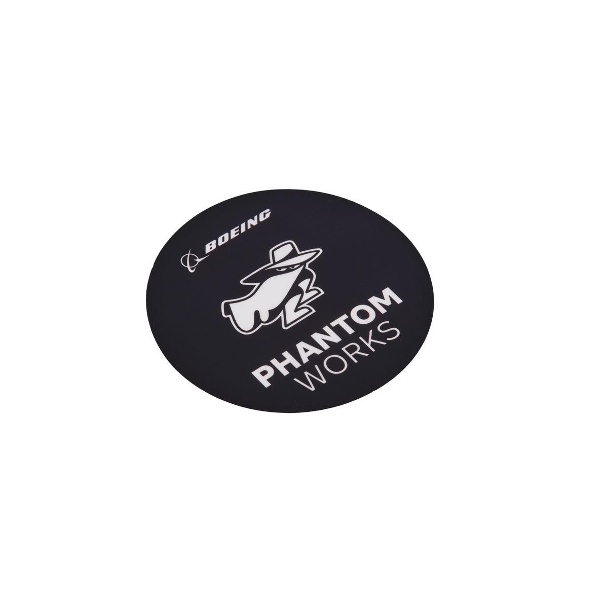 The Boeing Phantom Works Sticker from The Boeing Store is a black circular vinyl piece showcasing a ghost silhouette in a hat, with BOEING and PHANTOM WORKS in bold white text. Ideal for aviation fans, it prominently features the Boeing logo in the top left corner.