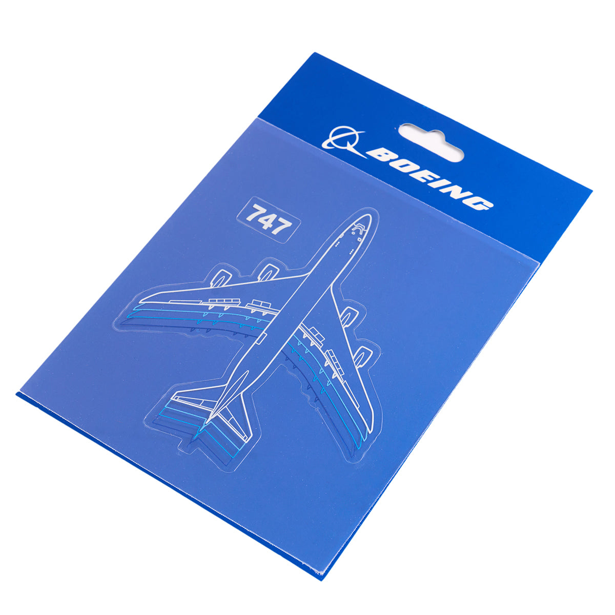The Boeing Stores waterproof vinyl Boeing 747 Motion Sticker features an outlined airplane graphic and logo on a display card with a hang tab, making it ideal for customizing water bottles or adding to your 747 sticker pack.