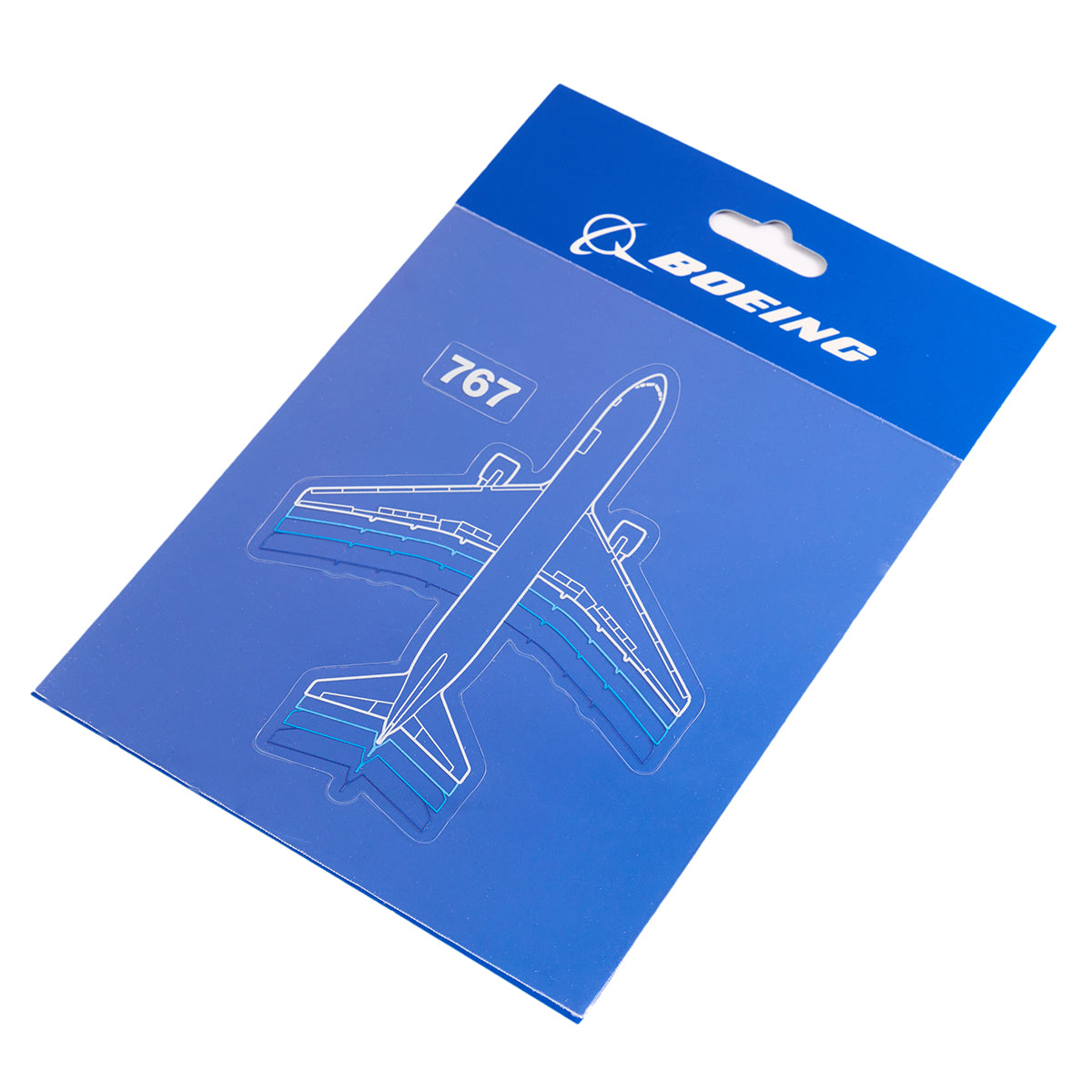 The Boeing Stores Boeing 767 Motion Sticker features blue packaging with a sleek line drawing of a Boeing 767 airplane, complete with the Boeing logo in the top right. Made from waterproof vinyl, it accentuates the aircrafts sleek shape and wing structure.