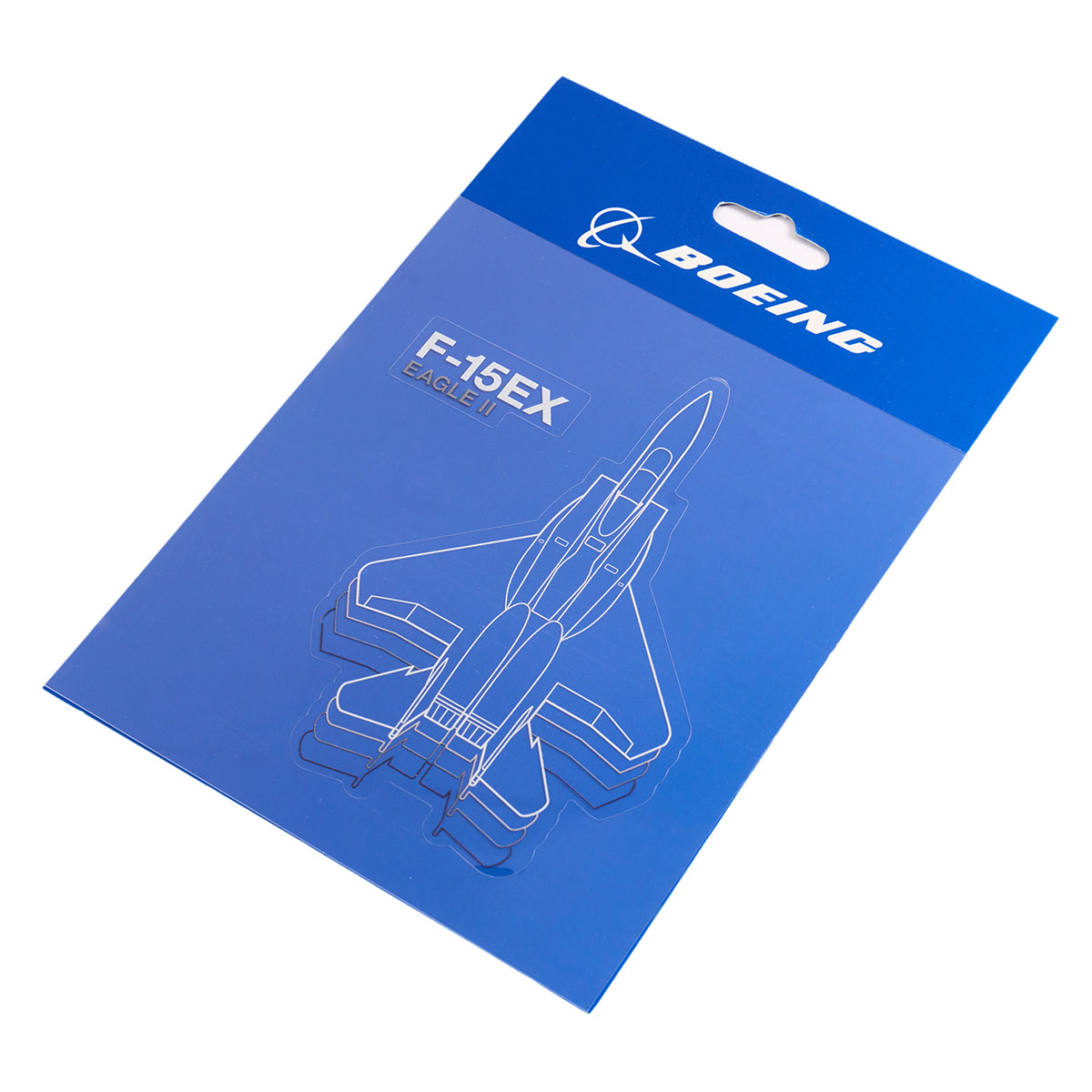 The blue packaging of The Boeing Stores F-15EX Eagle Motion Sticker features a waterproof vinyl design, adorned with a white outline of the F-15EX Eagle II and the Boeing logo prominently displayed at the top.
