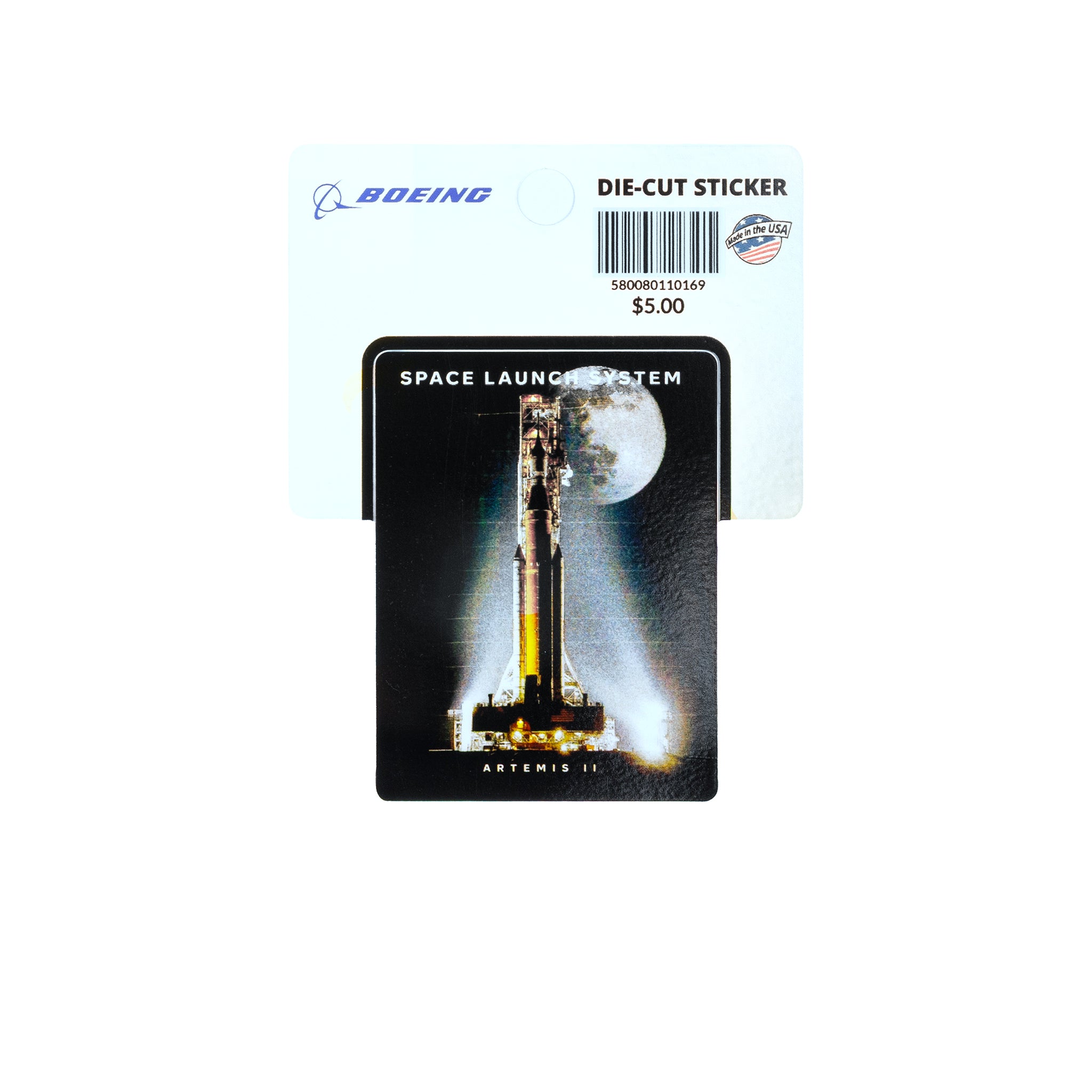 The Boeing SLS Artemis II Graphic Vinyl Sticker features the Space Launch System rocket against a full moon, attached to a BOEING-branded backing card. Perfect for space fans and priced at $5.00.