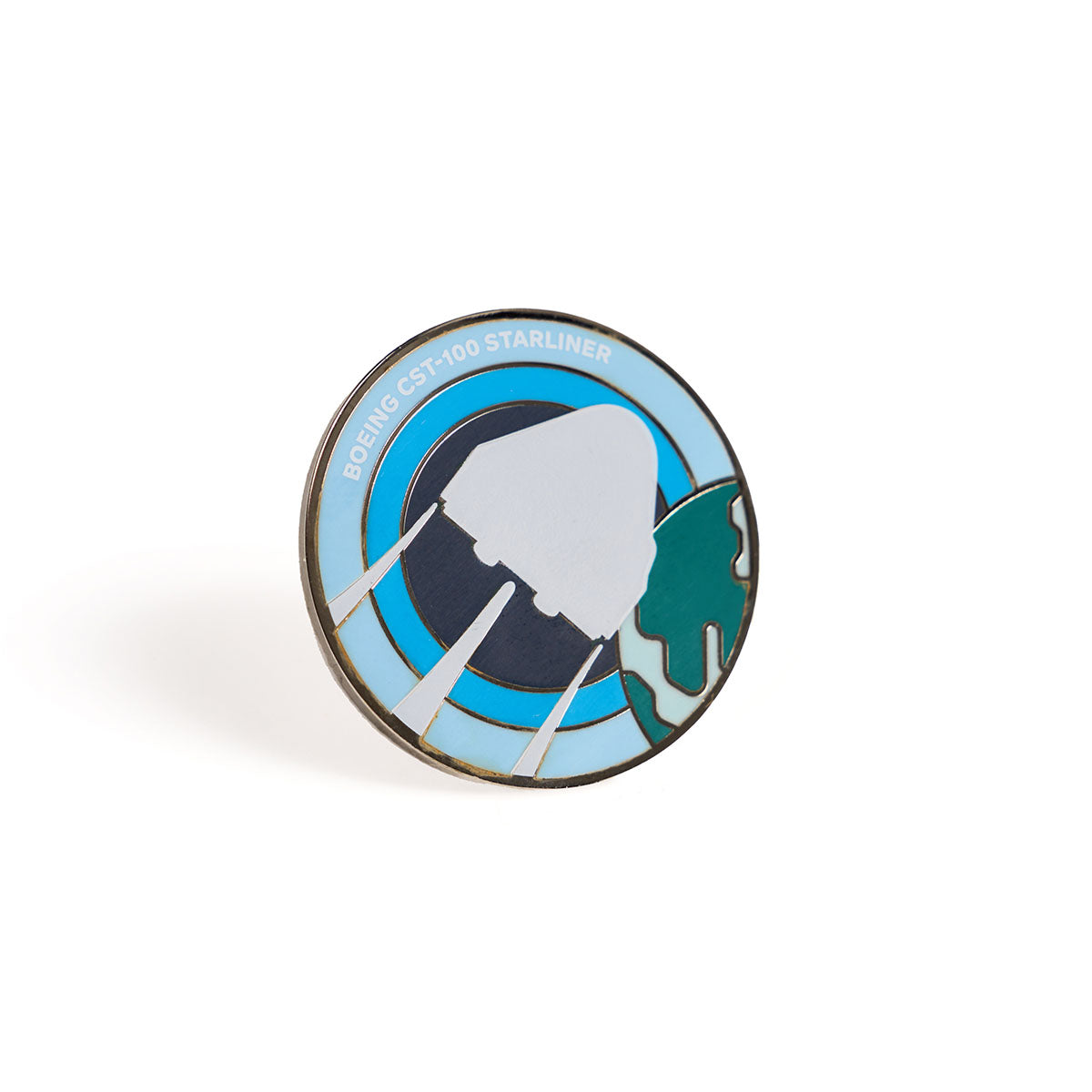 The Boeing CST-100 Starliner Skyward Lapel Pin by Boeing is a round commemorative design with an enchanting enamel roundel. It features a spacecraft silhouette, triple engines, and captures Earths celestial allure with aviation flair in a blue and black color scheme.