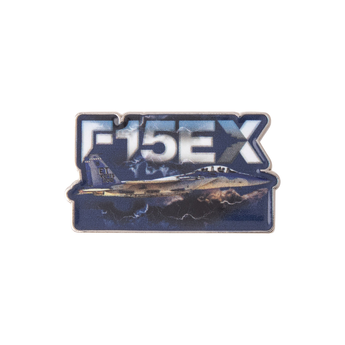A Boeing F-15EX Eagle Graphic Lapel Pin featuring a metal F-15EX fighter jet flying through clouds below the model name.