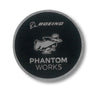 The Boeing Phantom Works 2025 Patch by BOEING features a circular black design with a mysterious figure in a hat and cape, and "PHANTOM WORKS" in silver below—an eye-catching collectible for Boeing fans.