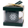 Boeing Jet Snowflake mug inside of the clear gift box, wrapped with gold ribbon.