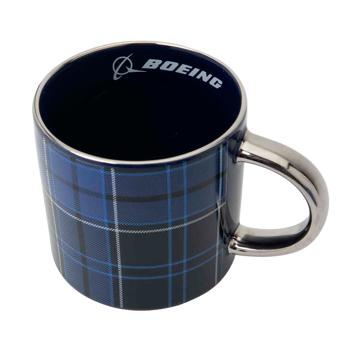 A Boeing Tartan 2026 Jet Snowflake ceramic mug with a blue and black plaid pattern, a metallic handle, and a brand logo printed on the inside rim.