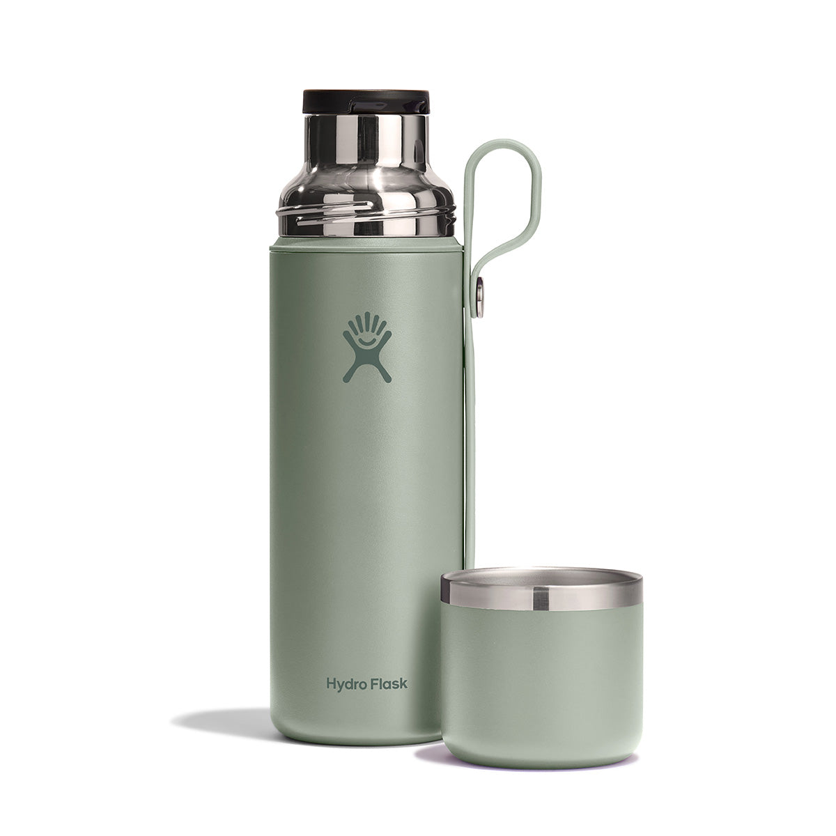 The BOEING Hydroflask Boeing 28 oz Flask & Cup in sage green features a stainless steel lid with carrying handle and a matching detachable cup. The bottle showcases the logo and is renowned for its leakproof hydration system.