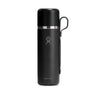 The BOEING Hydroflask Boeing 28 oz Flask & Cup, in black with a silver band and side handle, features a leakproof hydration system and stands upright on a white background.