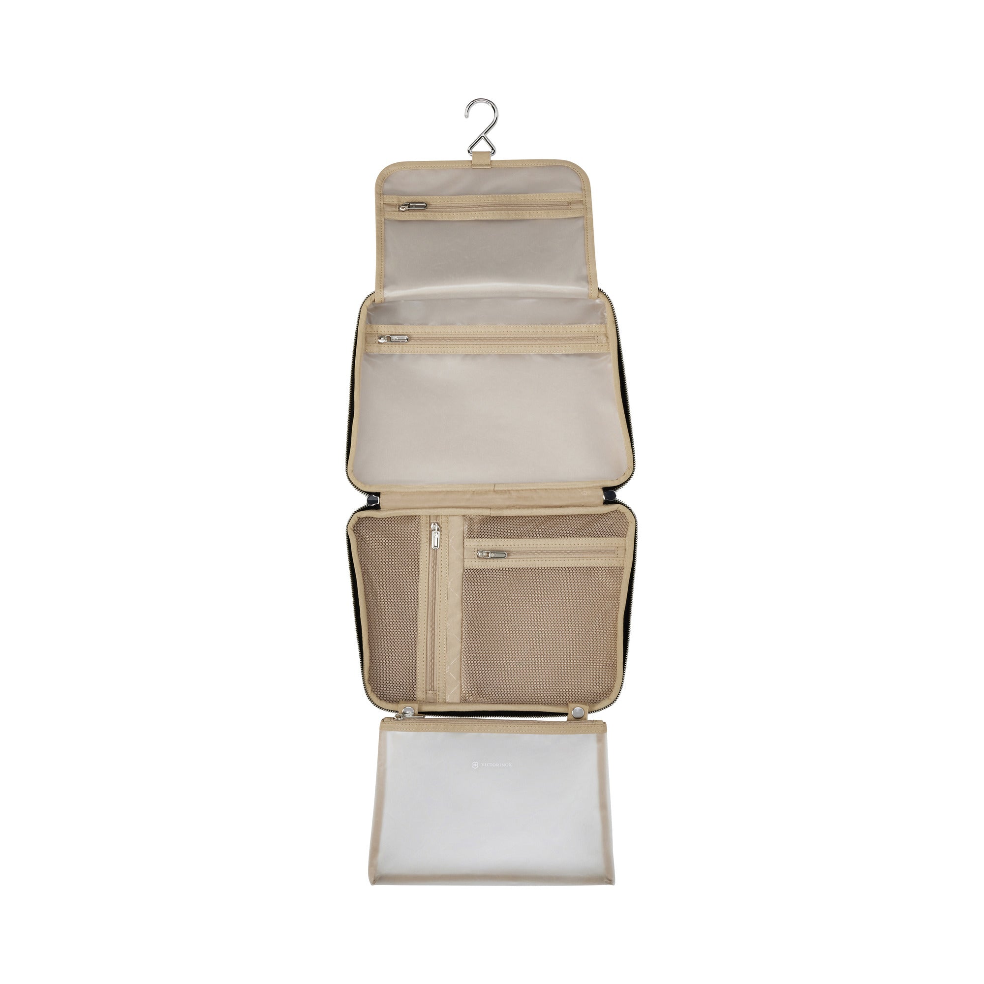 The Victorinox Victoria Signature Beauty Case by VICTORINOX, in beige, opens with an odor-resistant lining to reveal three zippered sections: two small pockets on top, mesh pockets in the middle, and a large pocket at the bottom. A metal hook at the top allows for easy hanging.