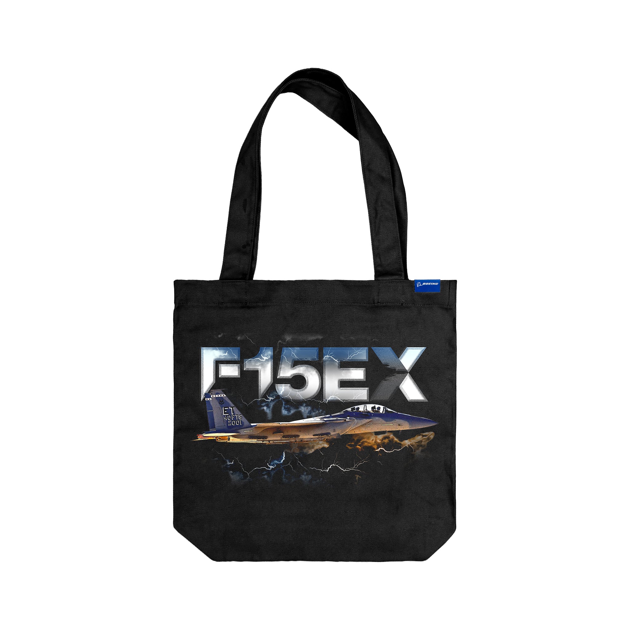 Ideal for aviation fans, the Boeing F-15EX Eagle II Graphic Tote from BOEING features a striking in-flight F-15EX illustration with lightning effects and bold model text above the jet.
