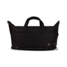 The Boeing Symbol Duffle Bag by BOEING is black with two handles, a shoulder strap, multiple zippers, and features a small round Boeing logo in the lower right corner.