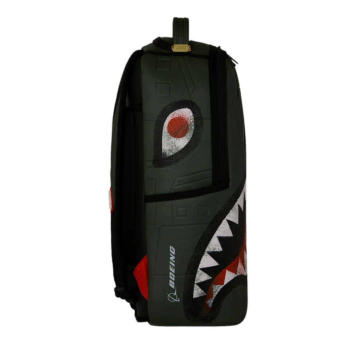 The Sprayground Boeing AH-64 Apache Sharkmouth DLXSV Backpack by BOEING features a dark green colorway with a stylized shark face, complete with red eye and white teeth graphic details. Inspired by aviation heritage, this backpack showcases the word "BOEING" printed in white on the side, blending tactical style with iconic elements.