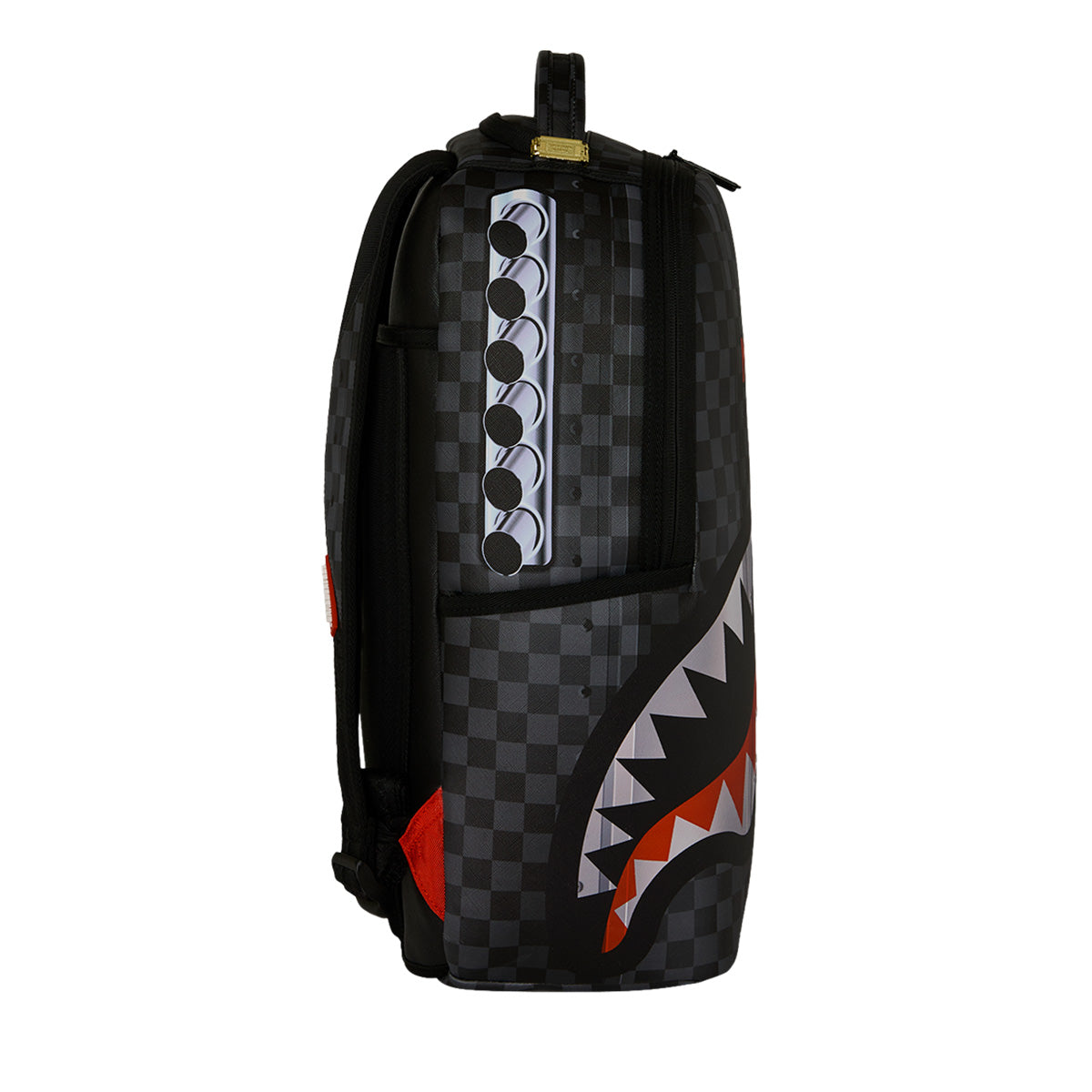 The Sprayground Boeing P-51 Mustang Sharkmouth DLXSV Backpack by BOEING showcases a black checkered design with a vertical row of silver circles, a fierce shark mouth graphic with sharp teeth on the side, exclusive Sprayground collaboration accents, and the iconic Boeing logo.