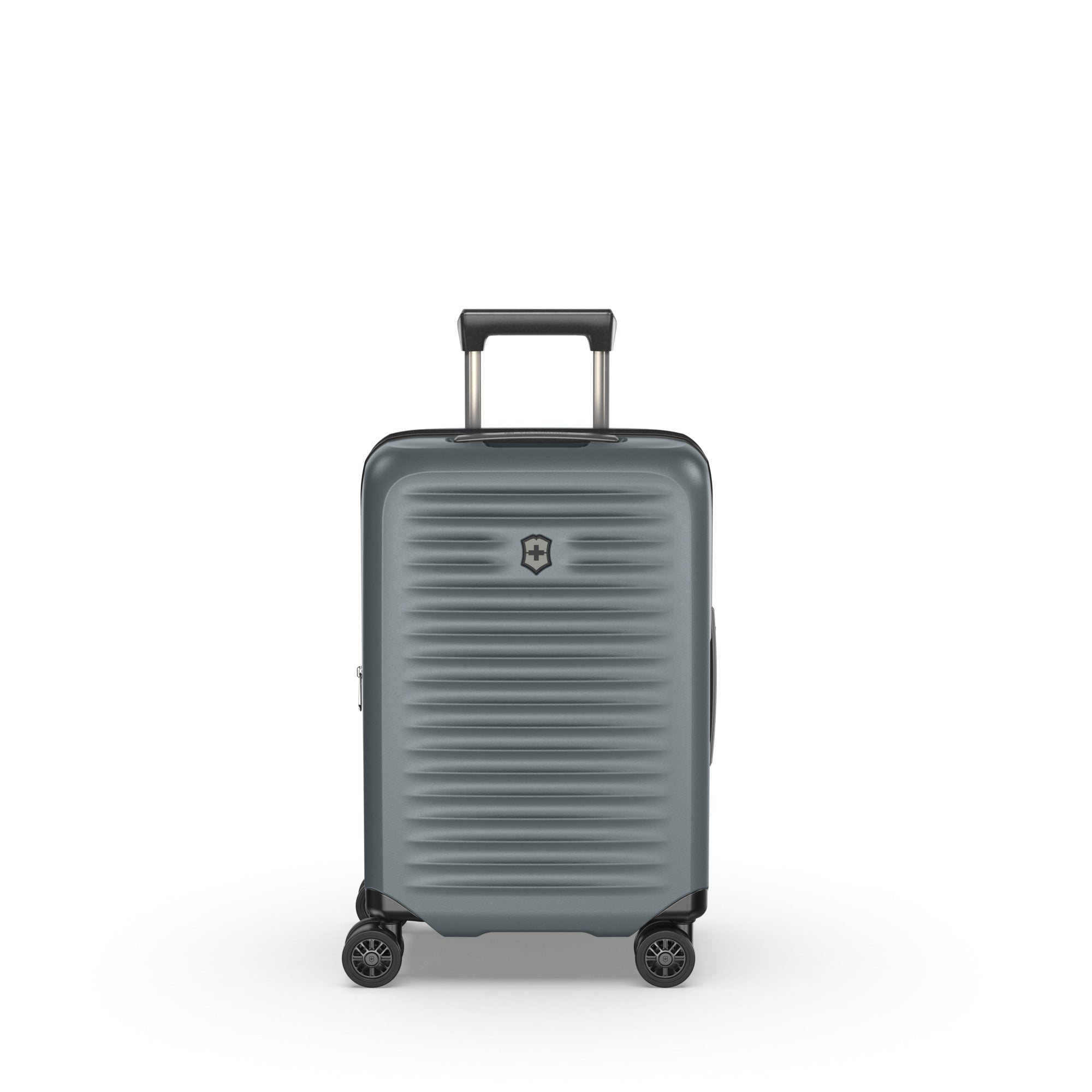 The Victorinox Airox Advanced Frequent Flyer Carry-on - Storm is a sleek, gray, hard-shell suitcase with a grooved design. It features VICTORINOX branding, four dual caster wheels, a telescopic handle, and a distinctive logo.