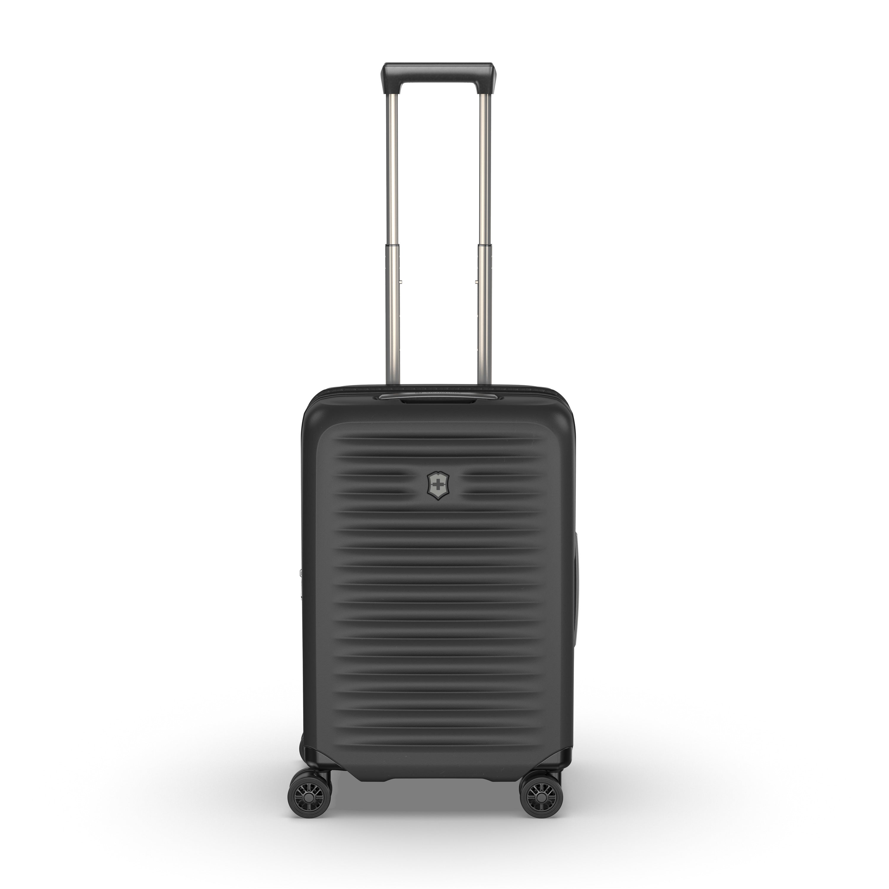 The Victorinox Airox Advanced Frequent Flyer Carry-on Plus - Black by VICTORINOX is a lightweight, hard-shell suitcase with four multidirectional wheels, a telescopic handle, and features a ribbed design and small emblem for added elegance.