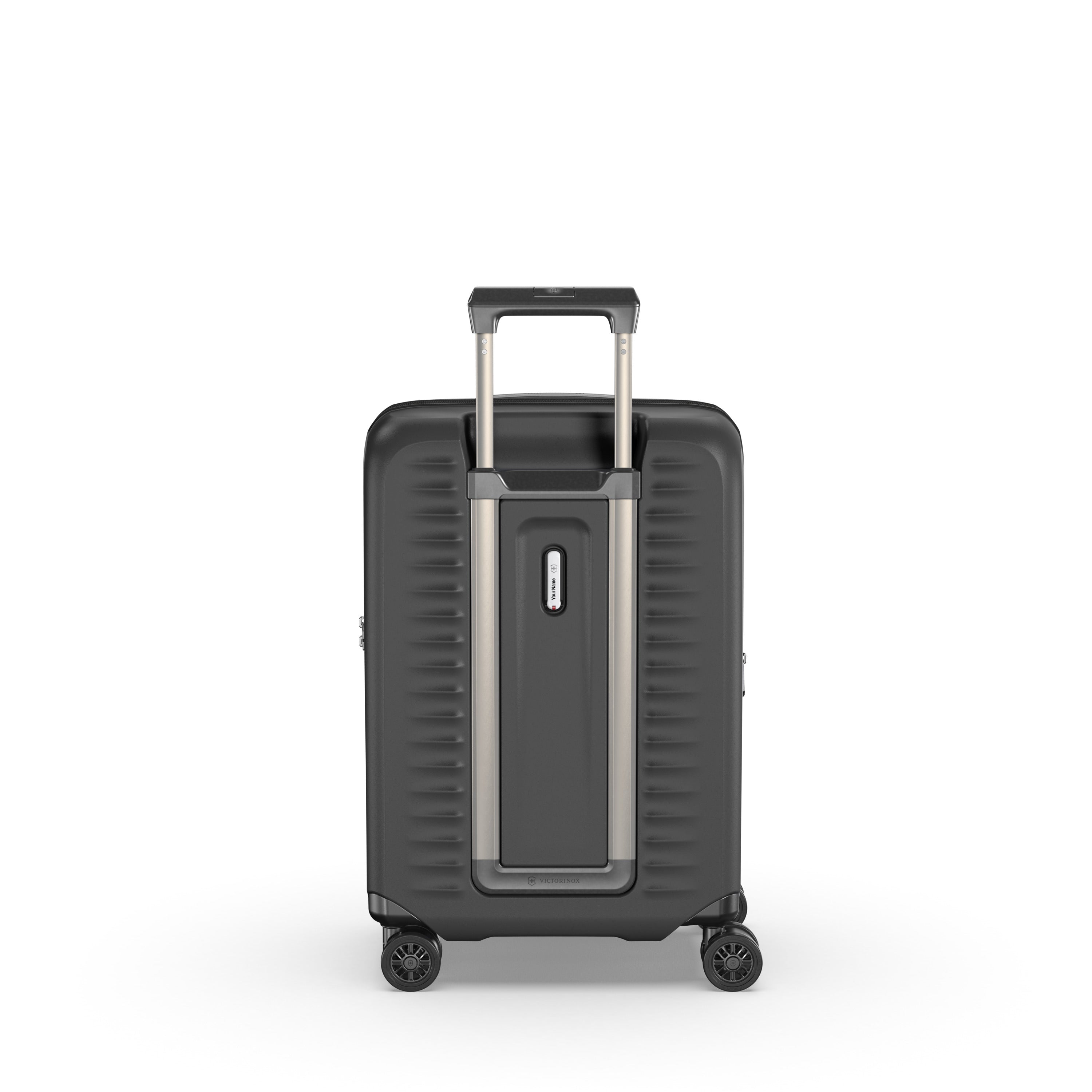 The Victorinox Airox Advanced Frequent Flyer Carry-on Plus in black features a sleek hard-shell design with an extended silver telescopic handle and four wheels. Ideal for frequent flyers, its lightweight with a vertical back strip including a built-in combination lock for security.