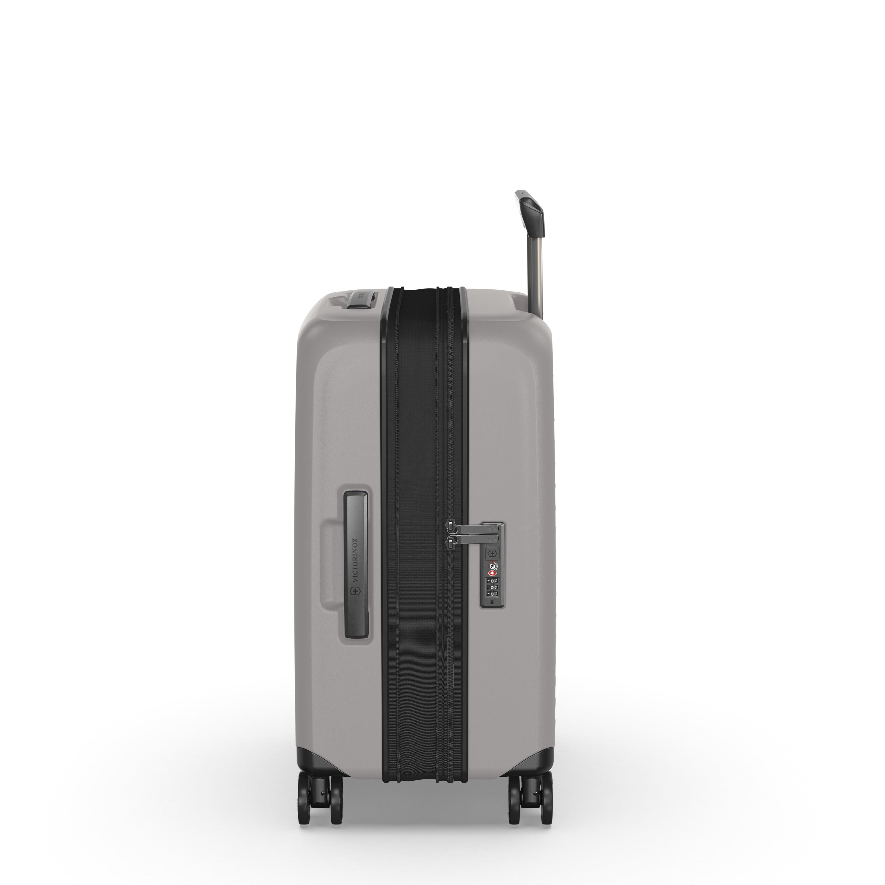 Side view of the elegant Victorinox Airox Advanced Frequent Flyer Carry-on Plus in Stone, highlighting its lightweight design. This hard-shell case by VICTORINOX features a telescopic handle, dual caster wheels, zipper closure, built-in lock, and side carry handle on a plain white background.