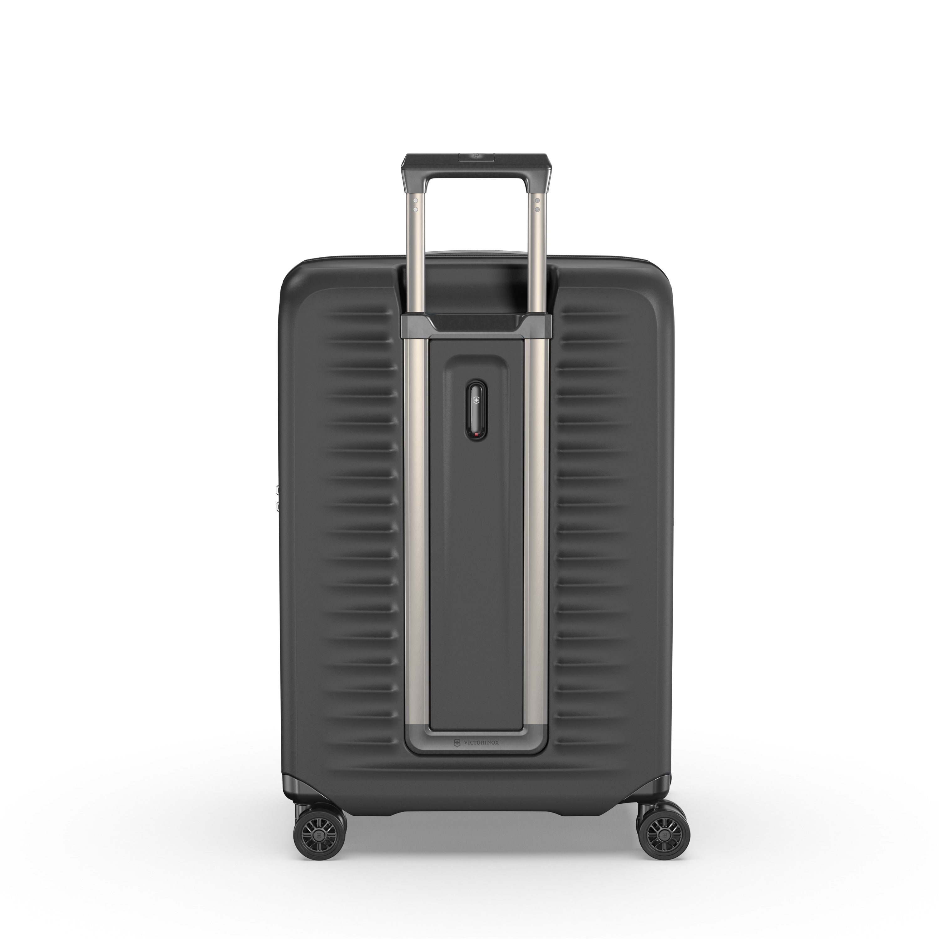 The Victorinox Airox Advanced Medium - Black by VICTORINOX boasts a sleek ribbed exterior, retractable silver handle, and four 360-degree roll wheels for easy movement. It features a lightweight hard-shell design with an anti-microbial lining for added protection.