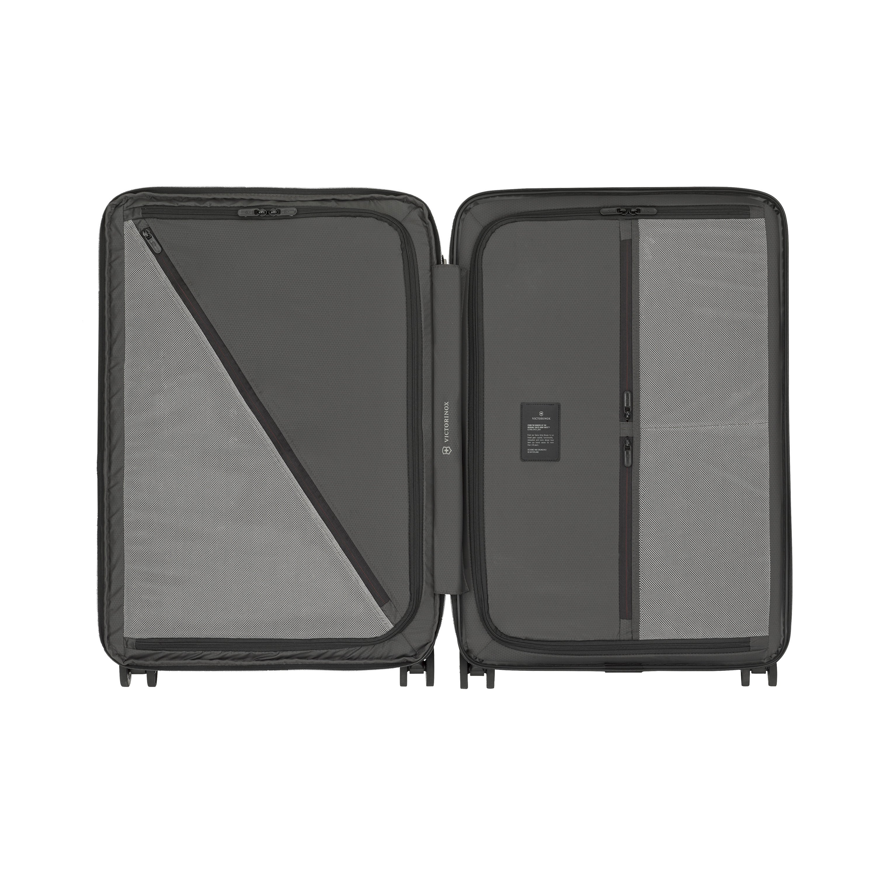 The Victorinox Airox Advanced Medium - Black by VICTORINOX features a sleek, lightweight design. Its open interior has a diagonal zippered mesh compartment on the left and two vertical zippered sections on the right, with 360-degree wheels ensuring effortless travel.