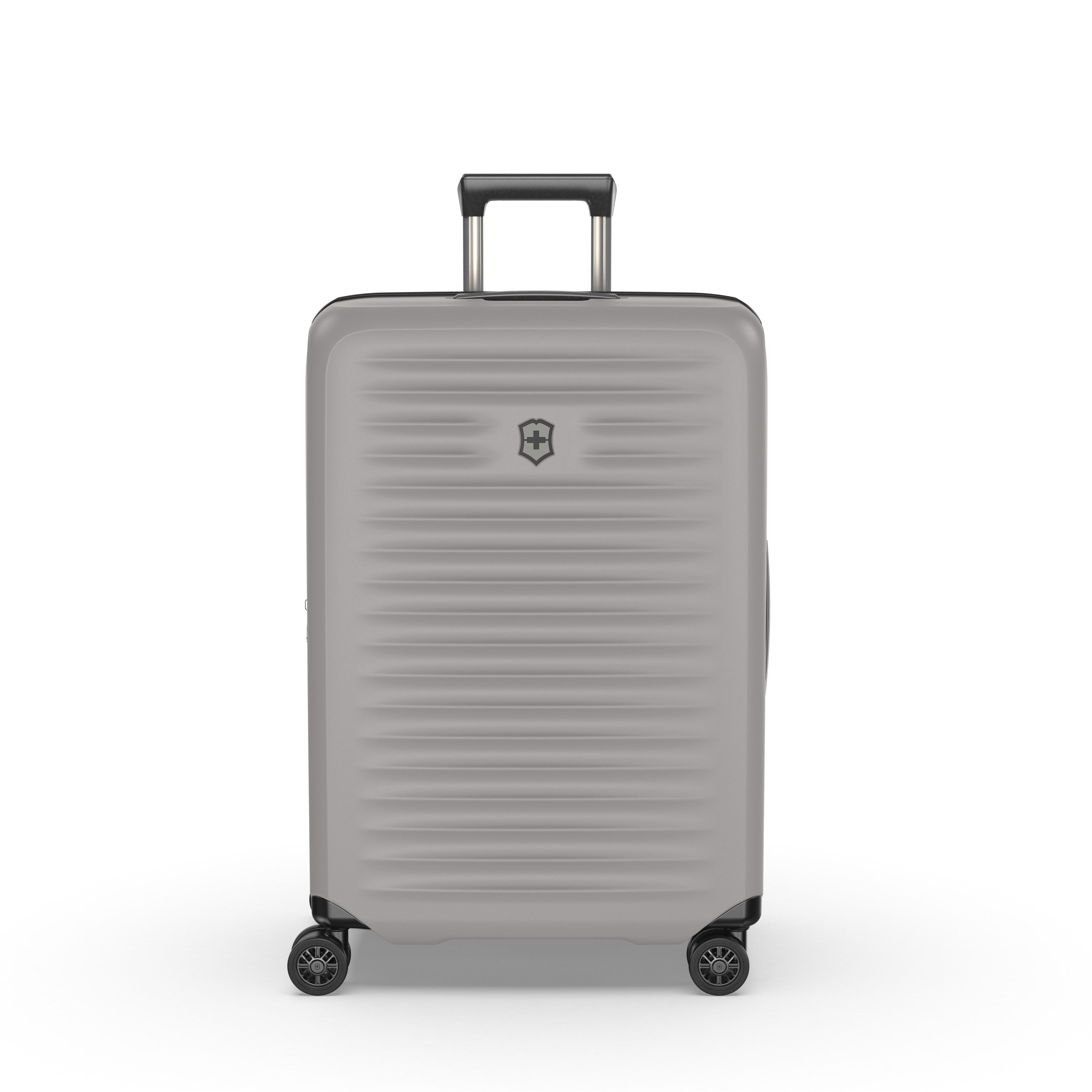 The Victorinox Airox Advanced Medium - Stone by VICTORINOX is a lightweight suitcase with four black wheels, an extendable handle, ridged texture, a small front logo, and an anti-microbial interior for freshness.