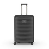 The Victorinox Airox Advanced Large - Black is a Swiss-engineered suitcase featuring four spinner wheels, a telescopic handle, and a textured horizontal ribbed pattern with a subtle emblem on the front.