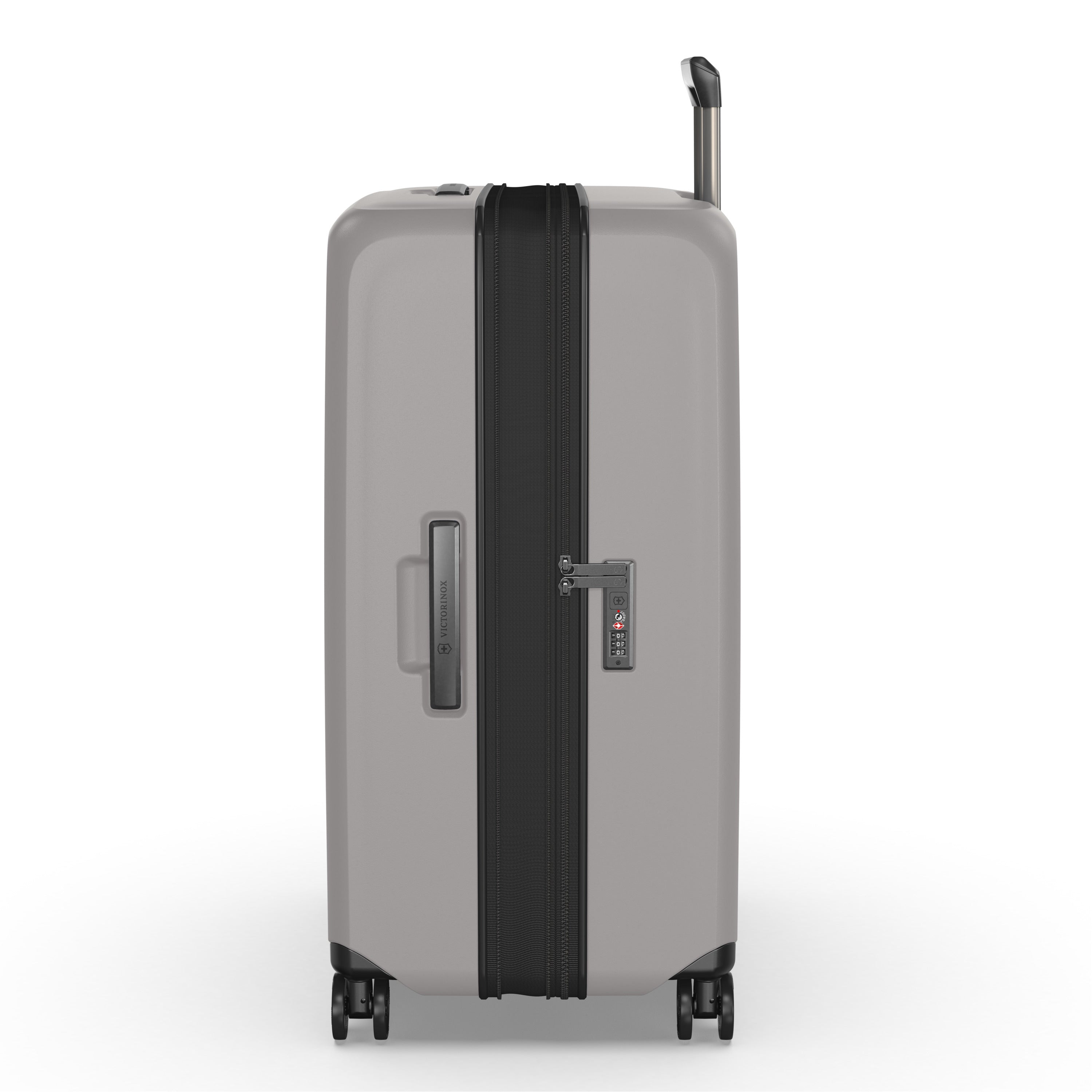 The VICTORINOX Airox Advanced Large - Stone suitcase, in a side view, features a black zipper, wheels, TSA lock, and extended telescopic handle. This lightweight luggage boasts a sleek design with an anti-microbial interior and the brand logo on the side handle.