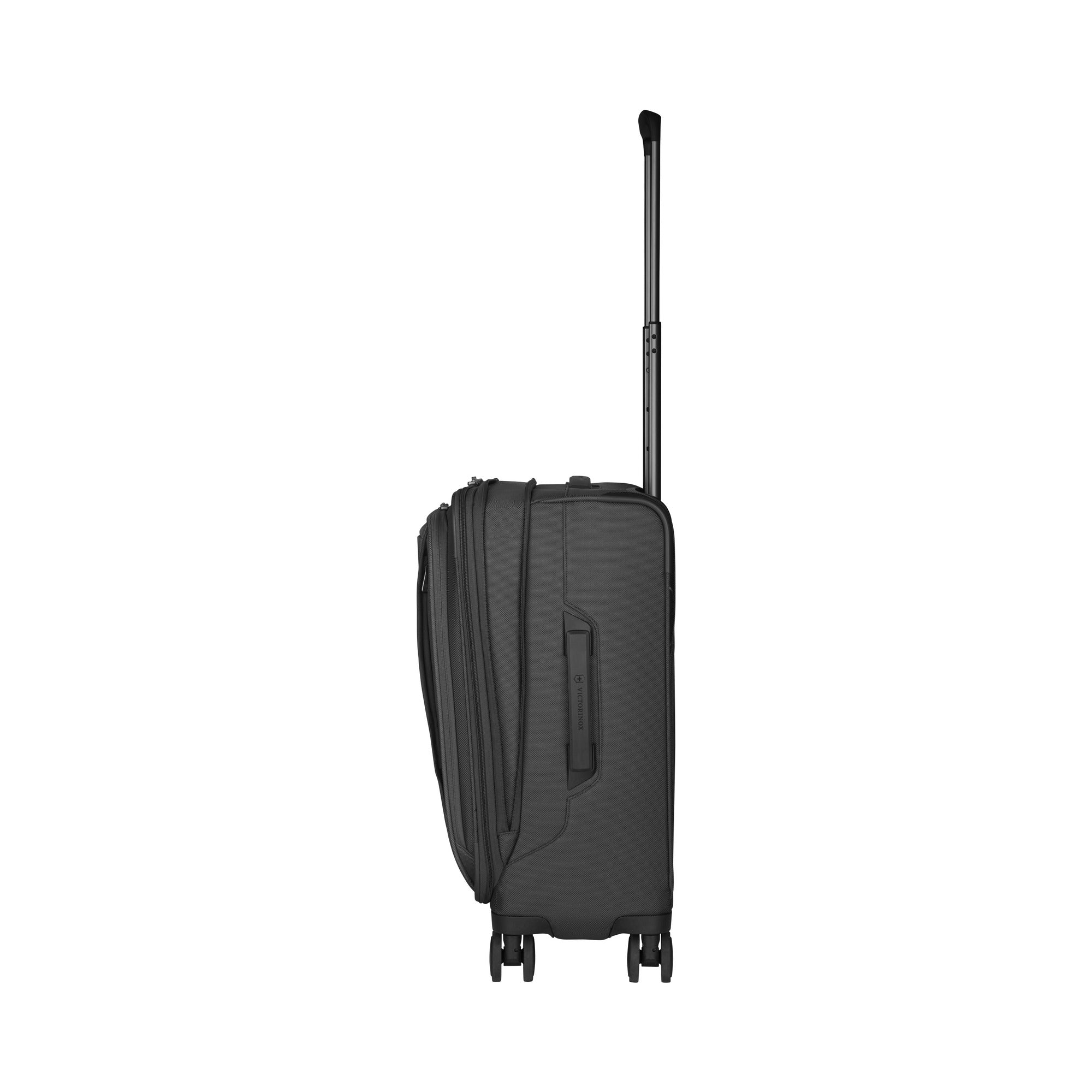 The Victorinox Werks 6.0 Frequent Flyer Plus Carry-on by VICTORINOX is a sleek black upright suitcase with dual caster wheels, a fully zipped nylon body, TSA lock, and side handle. Its retractable handle is extended, elegantly displaying it from the side.