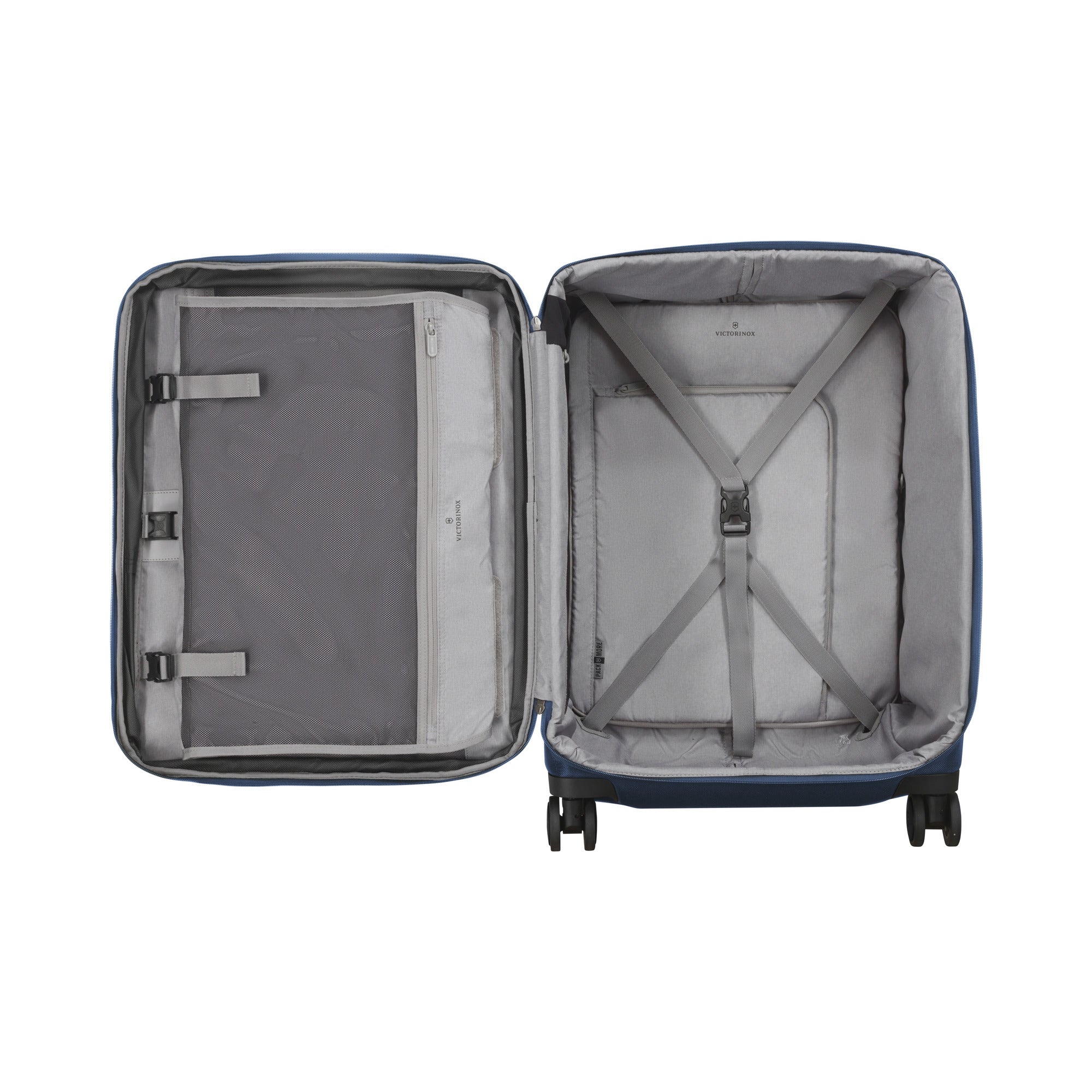 The Victorinox Werks 6.0 Medium Case by VICTORINOX showcases a blue ballistic nylon exterior with a gray interior. The left side has zippered mesh pockets and straps, while the right has elastic straps. It stands upright, highlighting its dual caster wheels.