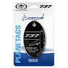 A black, limited edition BOEING PlaneTags Boeing 737 Series keychain made from authentic aircraft skin, this collectible comes mounted on a branded card featuring an aircraft illustration, serial number, and the GENUINE SKIN LIMITED EDITION label.