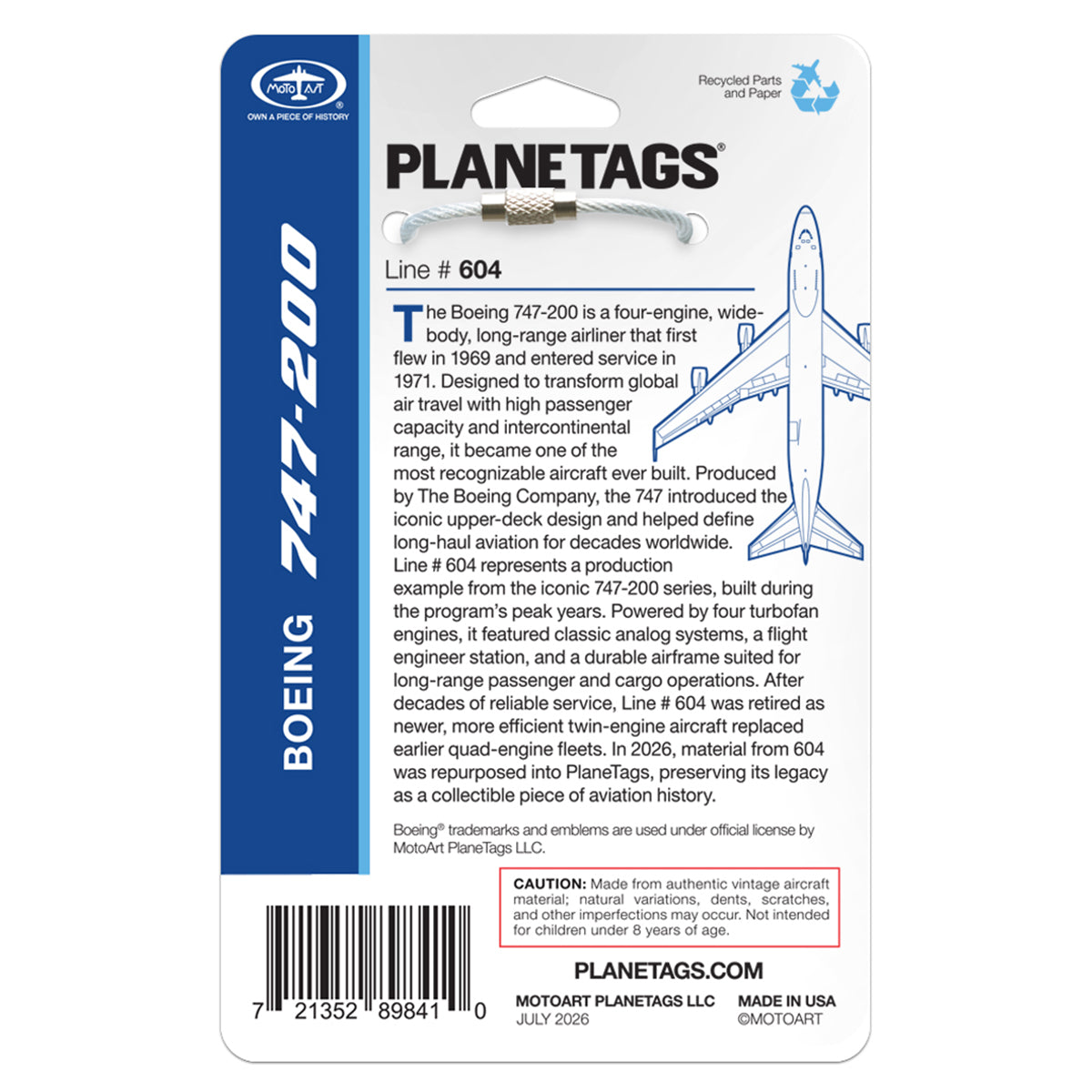 The back of a PlaneTags Boeing 747 Series package by BOEING describes Line #604, featuring detailed aircraft history and a caution note. The packaging displays blue and black text on a white background, includes a barcode and a small airplane image, and emphasizes that each PlaneTag is crafted from authentic Boeing 747 aircraft skin.