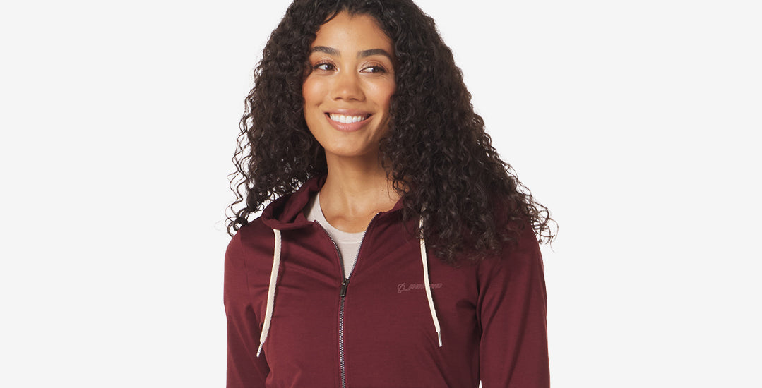 Burgundy zip-up jacket featuring the Boeing logo on the left chest, for casual wear.