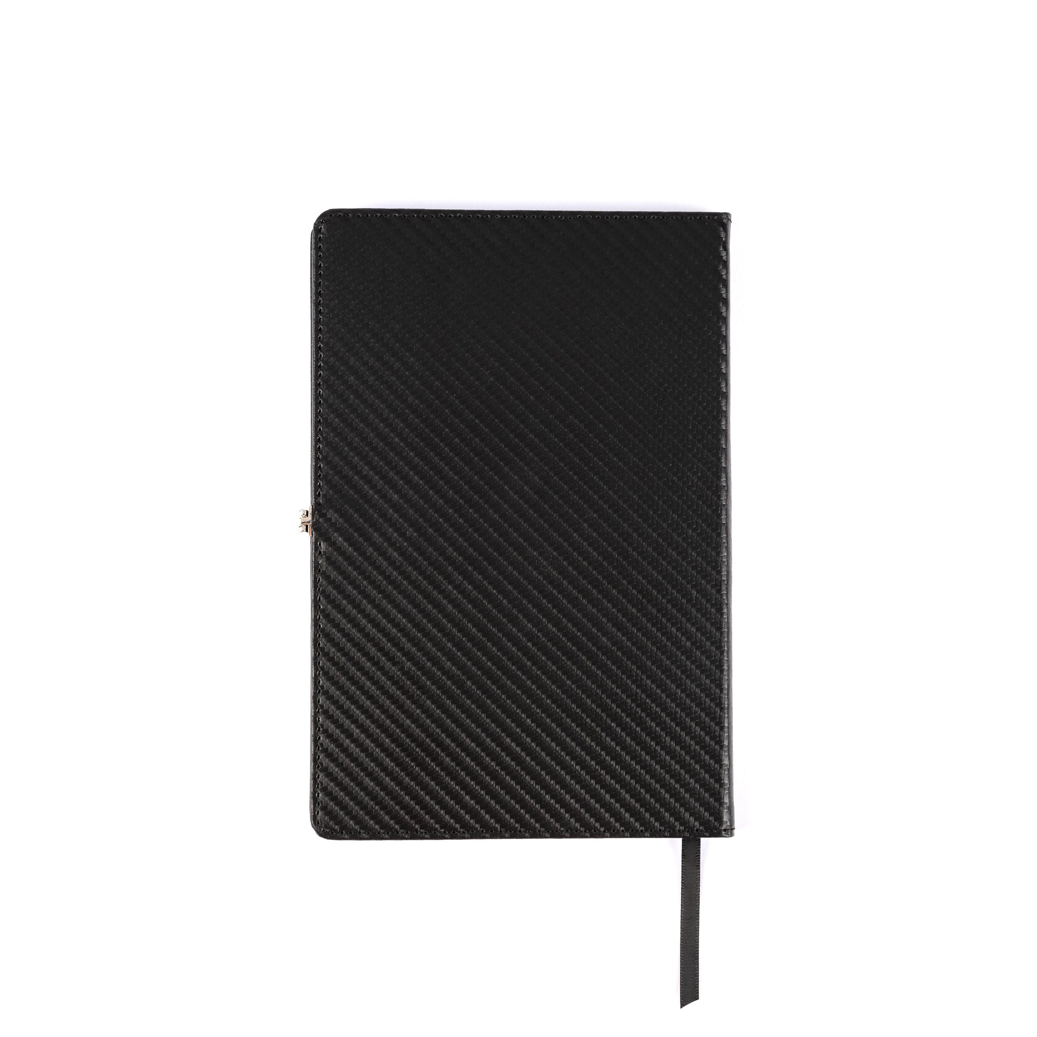 The Boeing Stores Boeing Carbon Fiber Notebook features a black PU hardcover with a textured carbon fiber-like design. It includes 100 GSM wood-free paper and a ribbon bookmark, set against a plain white background.