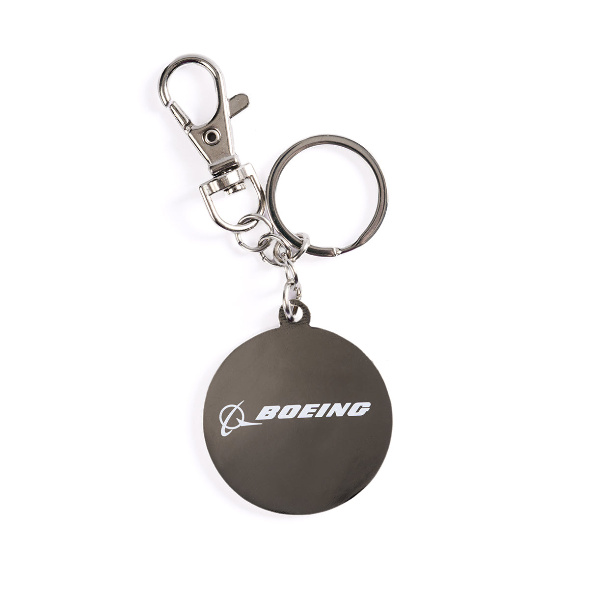 The Boeing Space Launch System Skyward Keychain is a metallic piece with a polished round pendant showcasing the Boeing logo in white. It includes a keyring and top clasp, offering an aviation-inspired, minimalistic design.